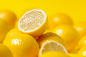 group of lemon on yellow background